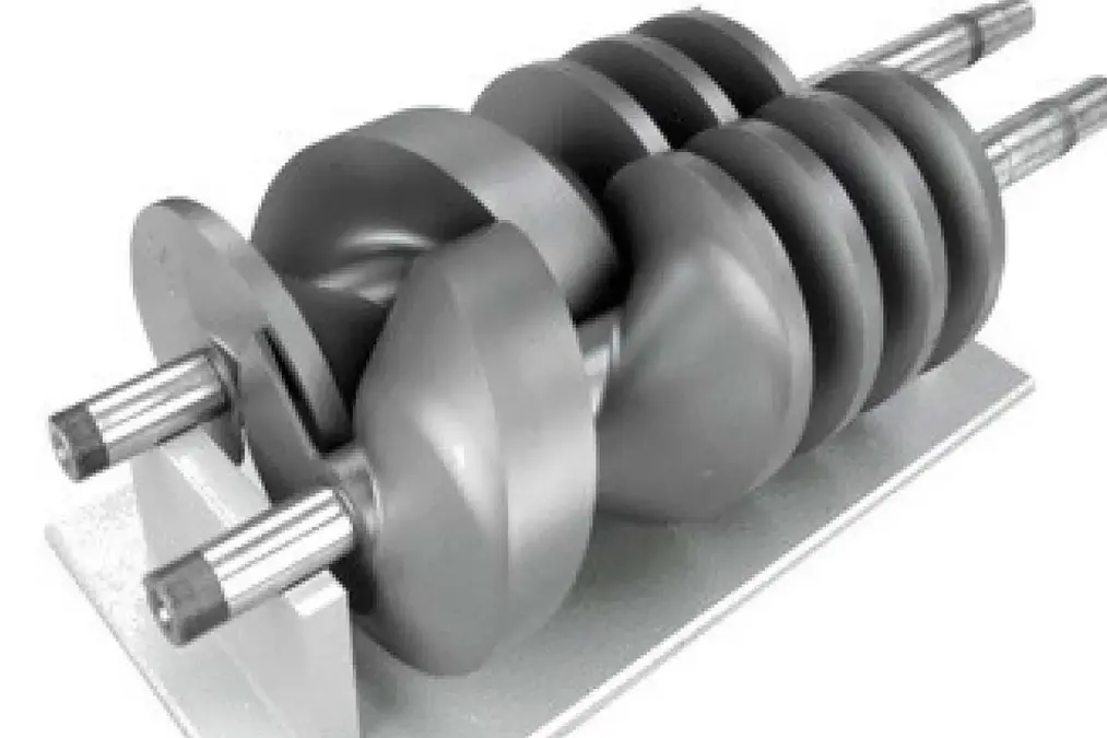 Two interlocking screw pump rotors mounted on a metal base, showing helical grooves and shafts