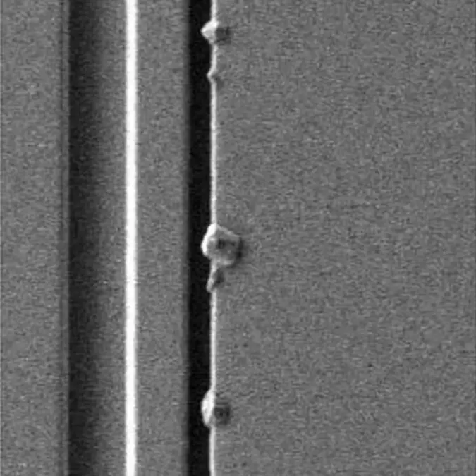 8_4_img_8_10_crystal_growth_at_edge_of_wafer_pattern